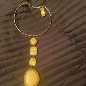 choker style gold necklace with 4 drop down stones with various shapes:sizes